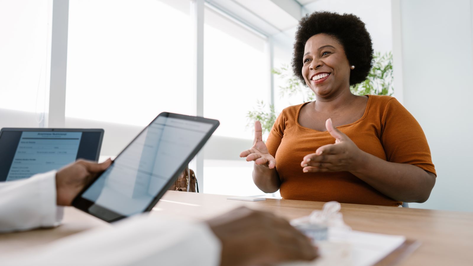 A professional display of weight management supplements and a stethoscope to explain what is orlistat