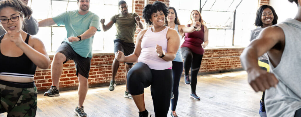 Diverse audience achieving fitness goals through wellness choices and polaris peptides alternatives