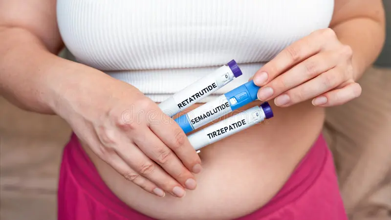 A person performing a cost evaluation for weight loss medication using a digital tablet