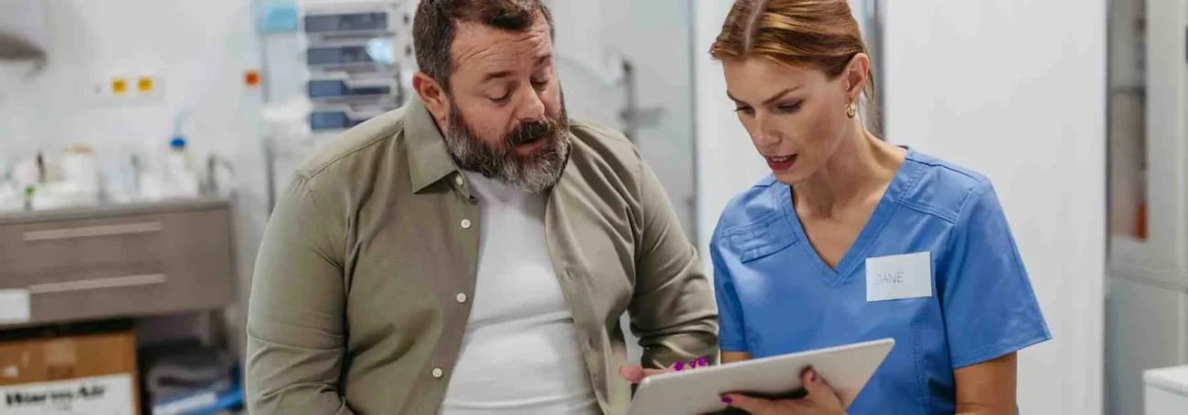 Medical professional discussing the side effects of semaglutide with a patient for a safety check